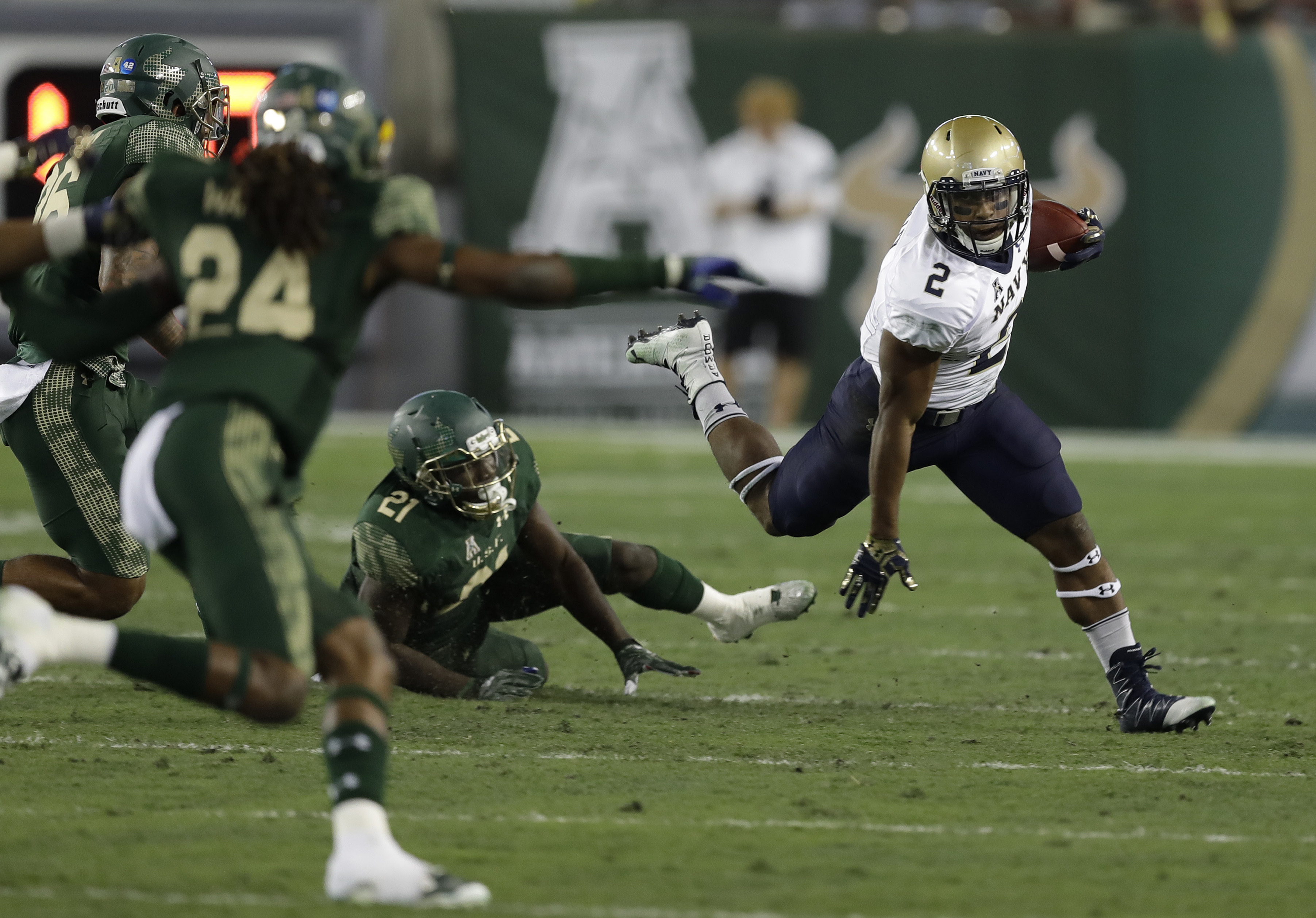 Flowers shines, South Florida beats No. 22 Navy 52-45